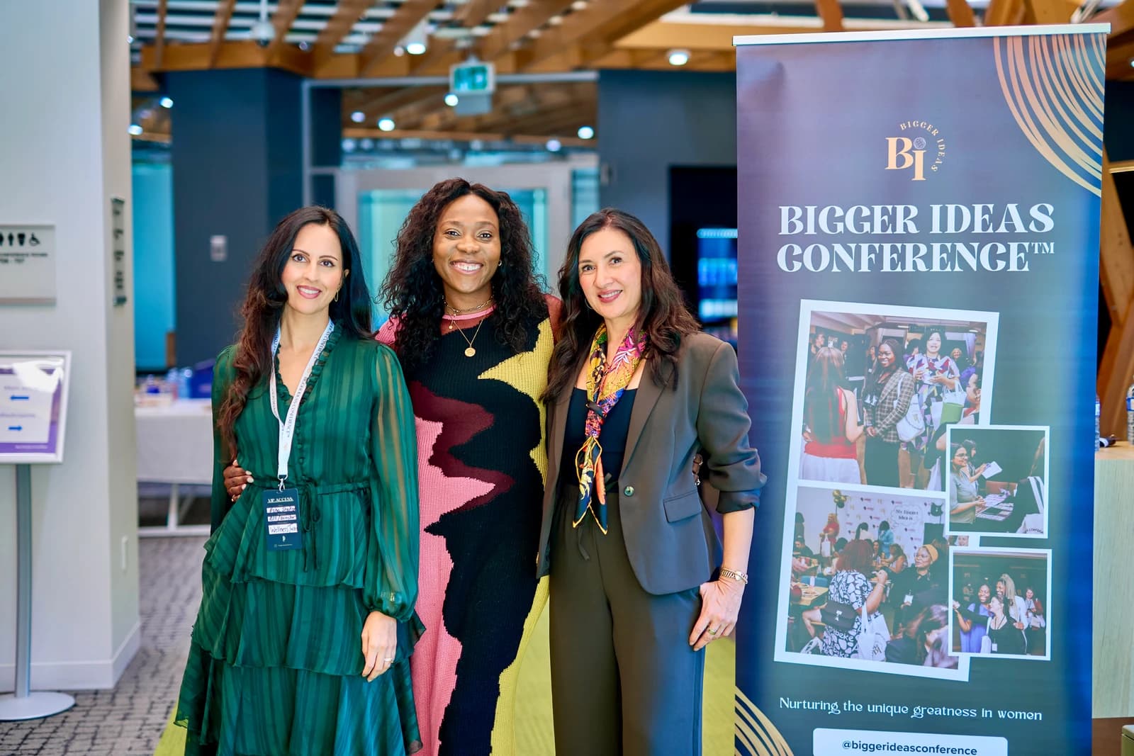 Speakers beside the Bigger Ideas Conference banner at the Wellness as Infrastructure panel, Simon Fraser University