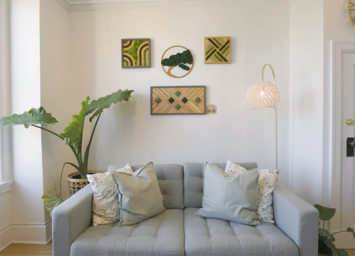 Session room with couch, wall art, and plant