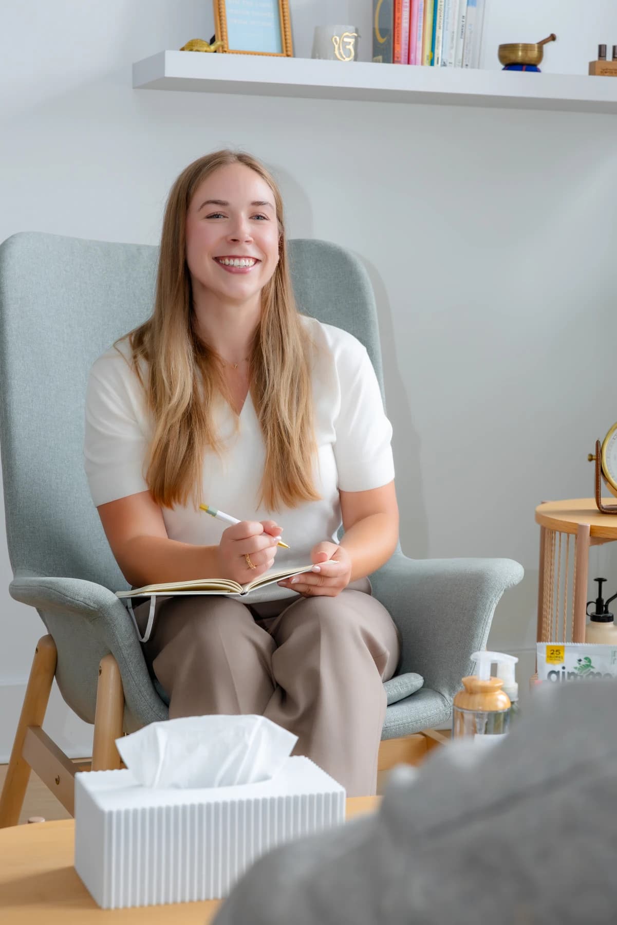 A Wellness Talks counsellor mid-conversation with a colleague