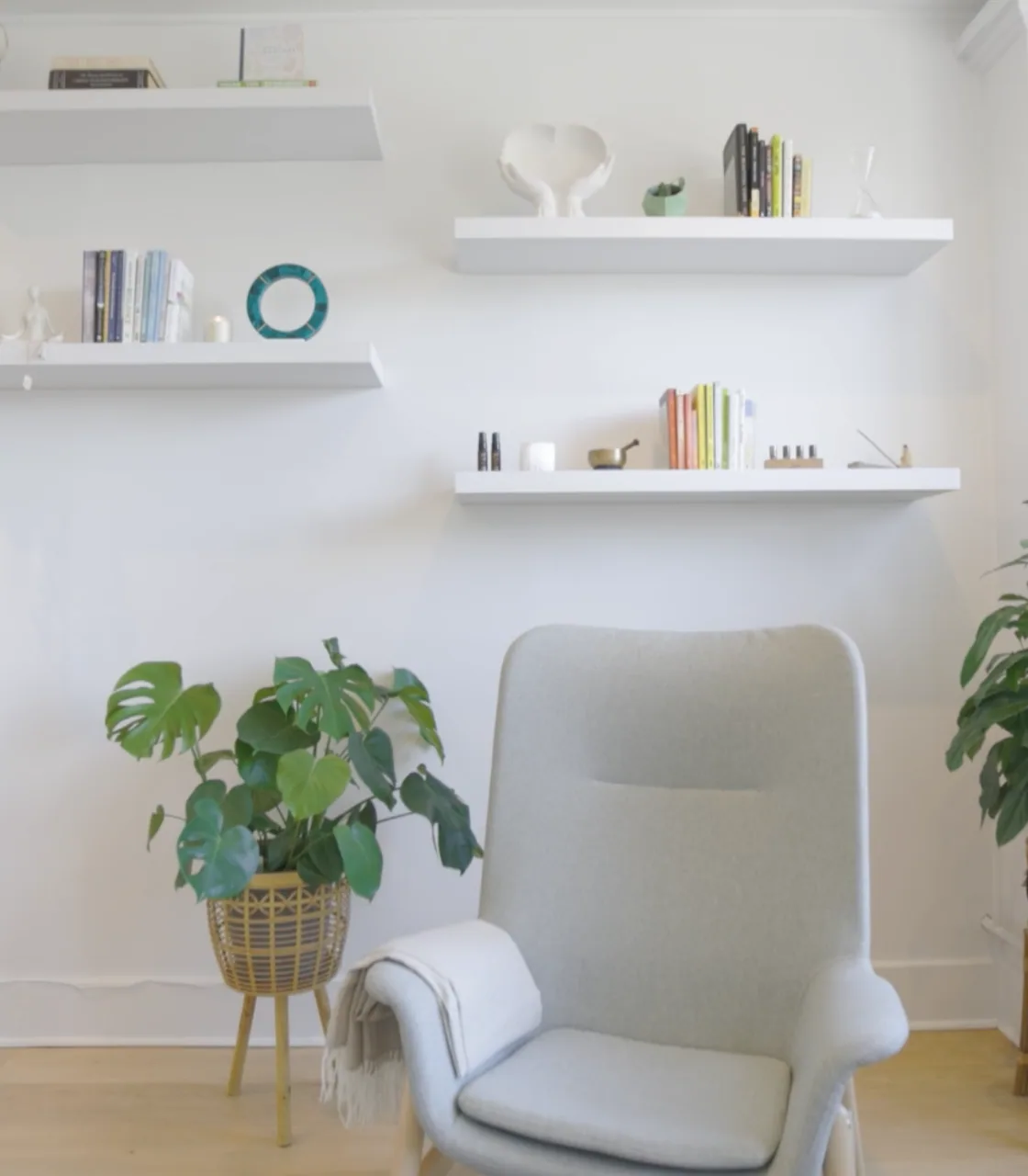 Wellness Talks Health Centre therapy room — soft chair, plants, and calm reading nook in our Downtown Vancouver clinic